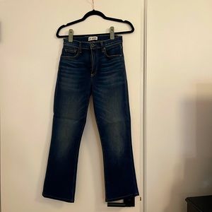 Blue jeans that are cropped. Great with sneakers